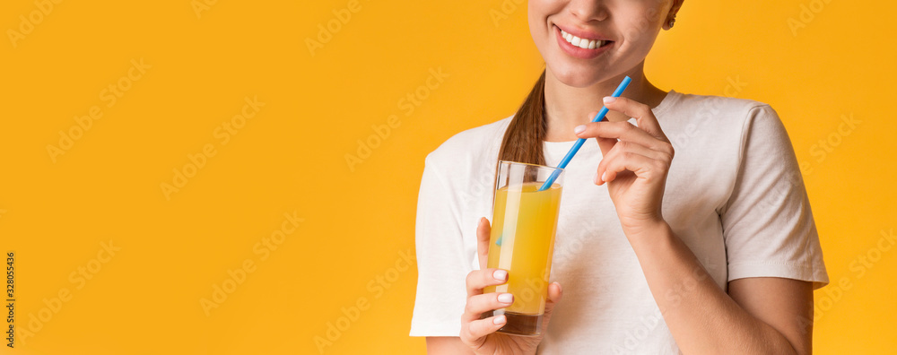 Glass Of Fresh Orange Juice In Hands Of Smiling Unrecognizable Woman Glass Of Fresh Orange Juice In Hands Of Smiling Unrecognizable Woman