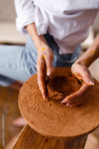 potter's wheel modeling clay women's hands mud work workshop profession hobby creativity art ceramics handwork businesswoman