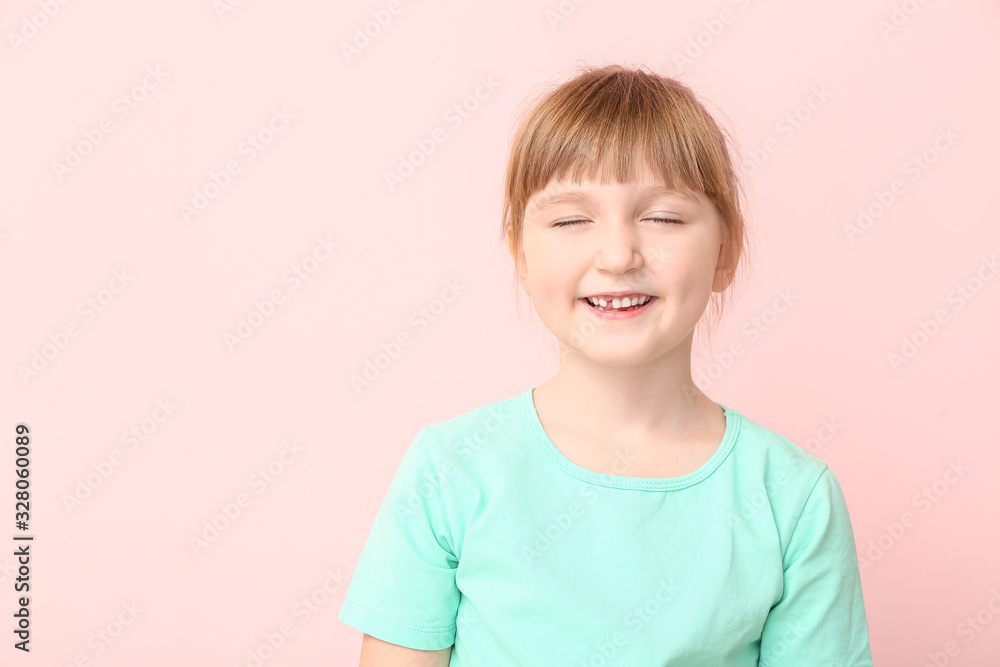 Smiling little girl on color background Smiling little girl on color background