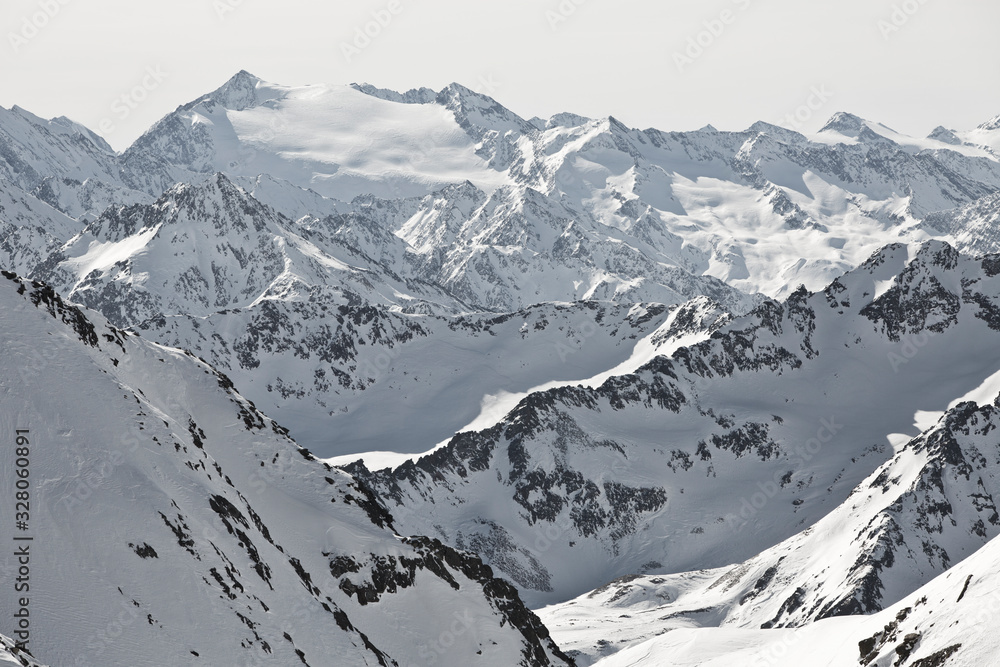 Alpine winter wonderland in Europe. Mountains in Austria in the Alps of Tyrol. Glacier Stubaier Gletscher. Perfect panorama
