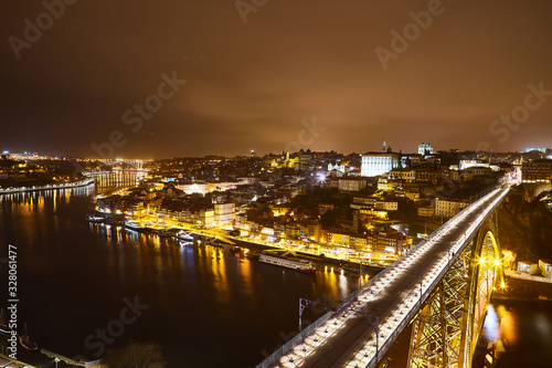 Porto: night panorama of Ribeira and Douro river, Portugal © bondvit
