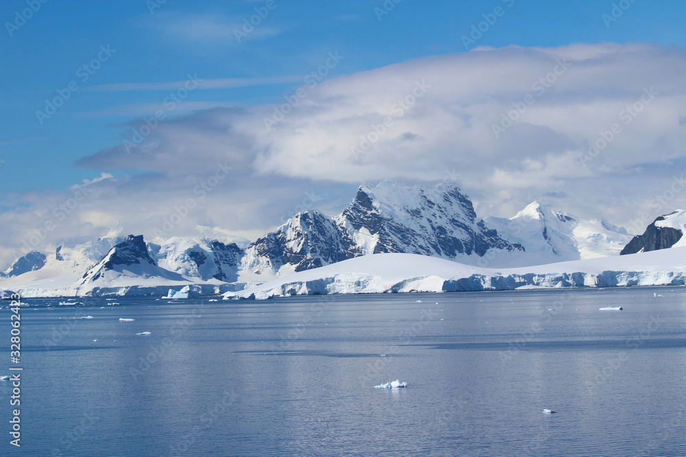 Mountains of the Antarctic Peninsula. The mountains in the Bismarck Strait at the entrance to Flandres Bay, Antarctica