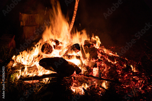 Night campfire with available space at left side.