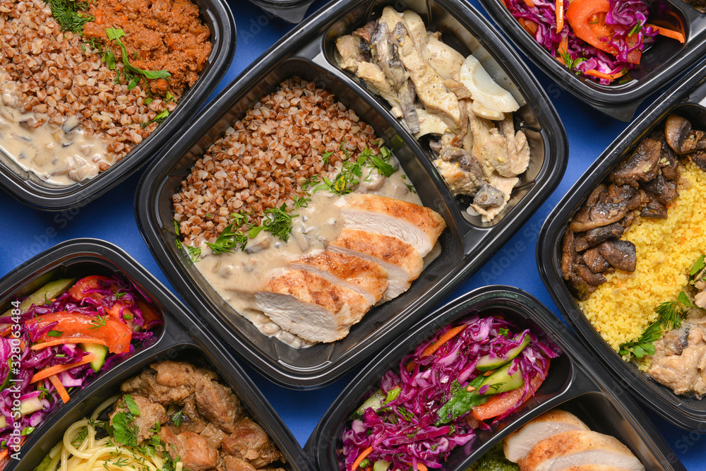 Containers with healthy food on color background Containers with healthy food on color background