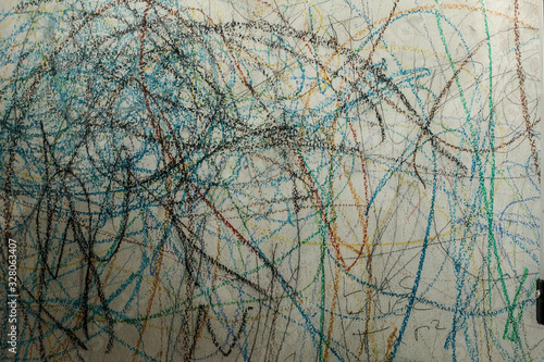Abstract drawing with crayon on the wall