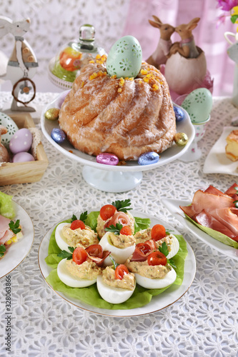easter breakfast with eggs stuffed with salad and ring cake
