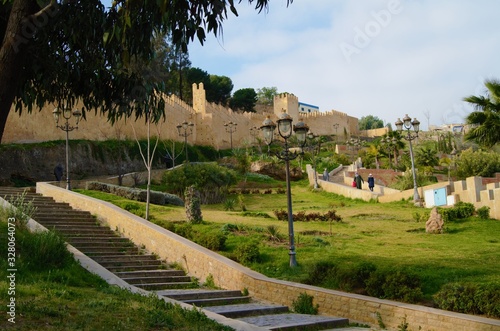 Historical stairs of Taza Morocco linking the higher and the lower parts of the city besides the wall of Bab Jamaa, atlas and rif mountains, gardens, park, plants, trees photo