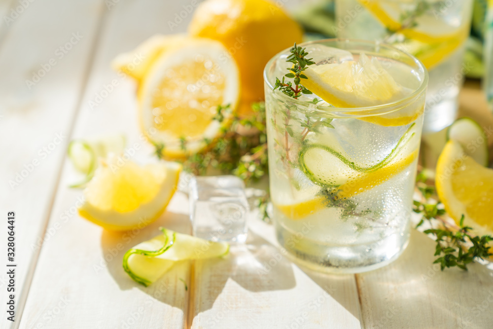 Detox drinks infused water and ingredients on wood background, copy space Detox drinks infused water and ingredients on wood background, copy space