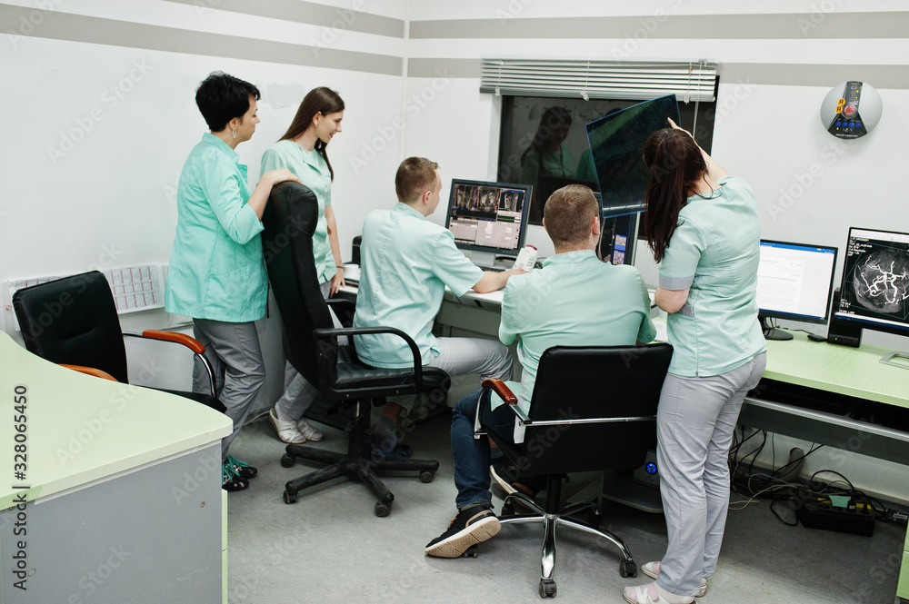 Medical theme.Observation room with a computer tomograph. The group of
