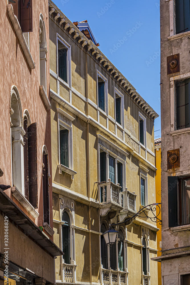 Beautiful architecture of old colorful houses in Venice. Venice - city in northeastern Italy, capital of Veneto region. Venice, Italy.