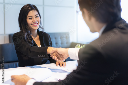 Photography HR manager interviewing female candidate applicant who recruit job in the office