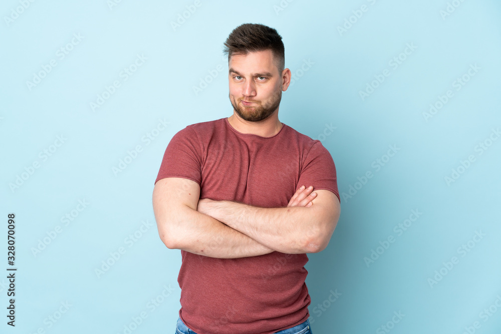Russian handsome man over isolated background feeling upset Russian handsome man over isolated background feeling upset