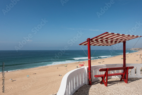 Fototapeta Naklejka Na Ścianę i Meble -  wooden bench seat with adjustable shading, Santa Cruz, Portugal
