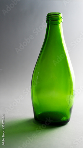 green bottle on a white background