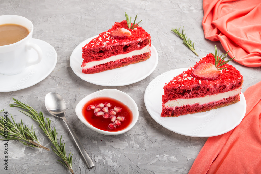 Homemade red velvet cake with milk cream and strawberry with cup of coffee on a gray concrete background. side view. Homemade red velvet cake with milk cream and strawberry with cup of coffee on a gray concrete background. side view.