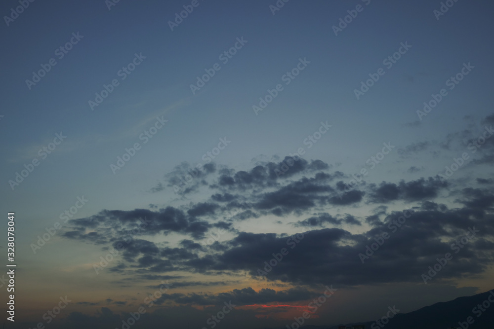 dark cloud above dusk sky