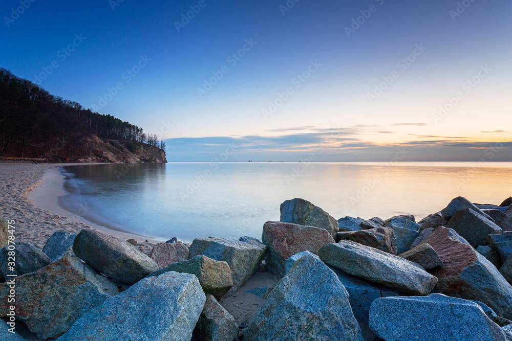 Cliff on the Baltic Sea beach at sunrise, Gdynia Orlowo. Poland