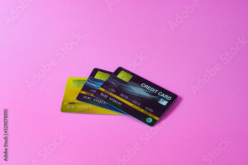 Credit card on pink background