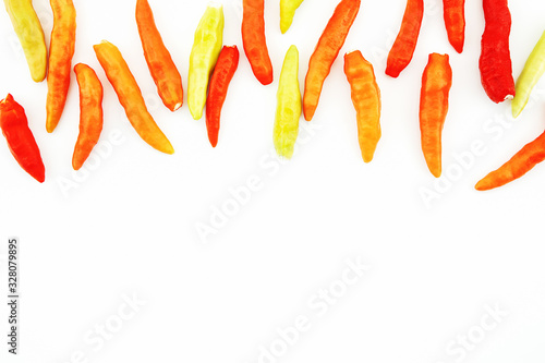 Fresh green and red chilli pepper texture frame isolated on white background