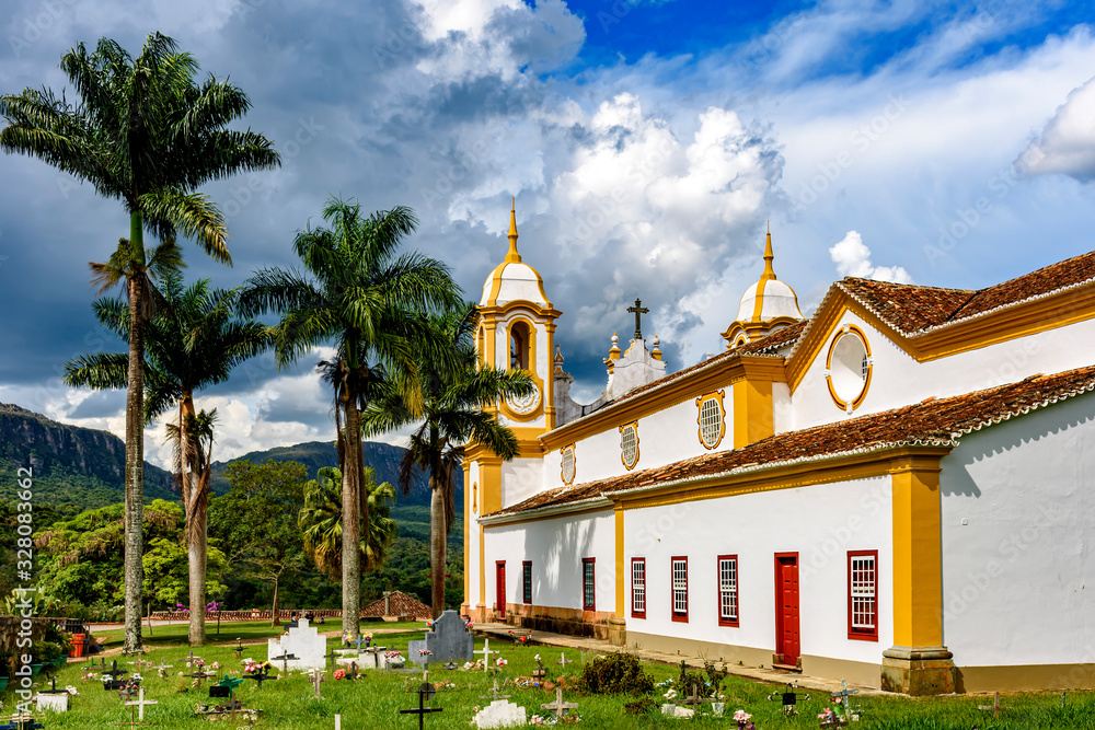 Old cemetery and garden next to an old and historic colonial church built in the 18th century in the city of Tiradentes, Minas Gerais, Brazil