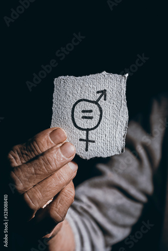 senior woman and symbol for gender equality photo