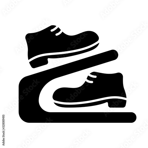 Cutout silhouette Shoe rack with boots. Outline icon of modern double storage. Black simple illustration of compact portable two-tier device for wardrobe. Flat isolated vector on white background