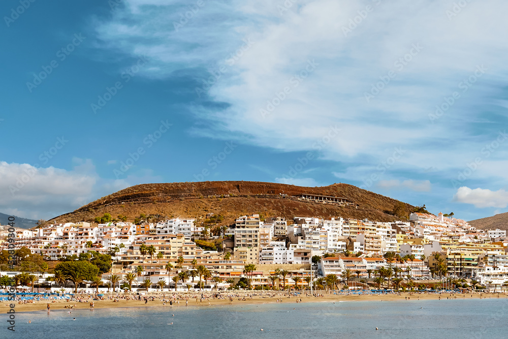 Tenerife island landscape . Seaside resort, mountain. Tourism and travel, vacation. Canary Islands on a summer day. 