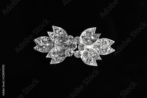 Brooch, jewelry on a black background, isolated