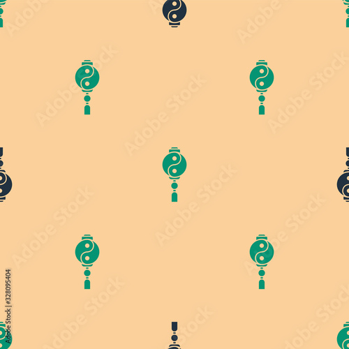 Green and black Yin Yang symbol of harmony and balance icon isolated seamless pattern on beige background. Vector Illustration