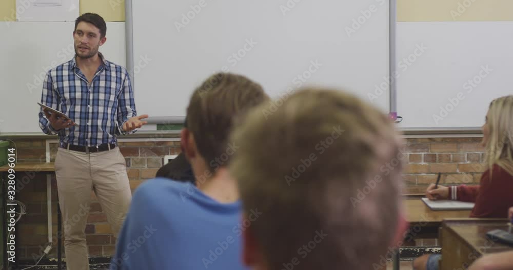 Teacher talking at his high school class Teacher talking at his high school class