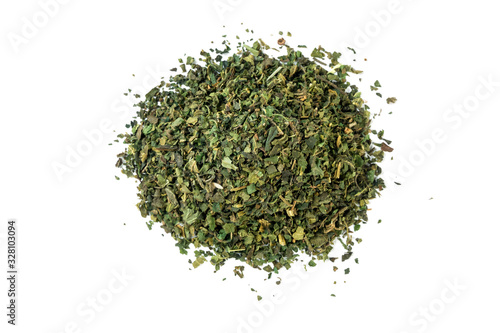 dried nettle herb or in latin Utricae folium heap of isolated on white background. medicinal healing herbs. herbal medicine. alternative medicine