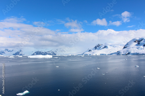 Icebergs and mountains at Paradise Bay on the Danco Coast  Antarctica