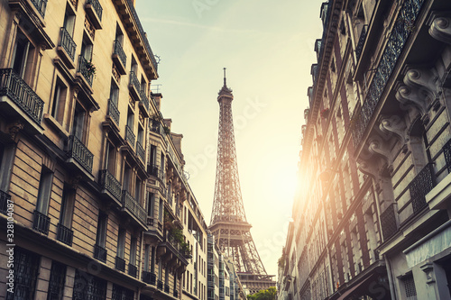Eiffel Tower at sunset in Paris, France. Vintage filter, retro effect. Famous travel destination © smallredgirl