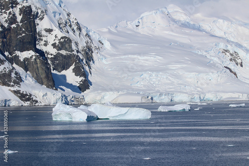 Icebergs and mountains at Paradise Bay on the Danco Coast  Antarctica