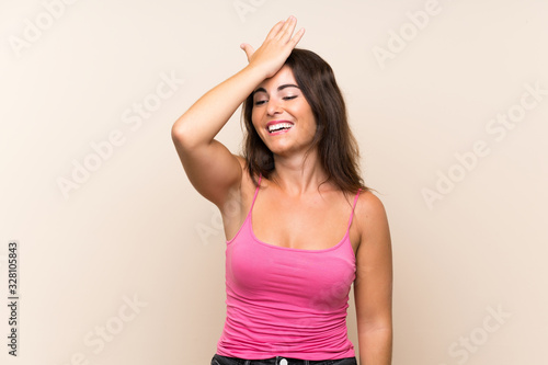 Young woman over isolated white background has realized something and intending the solution
