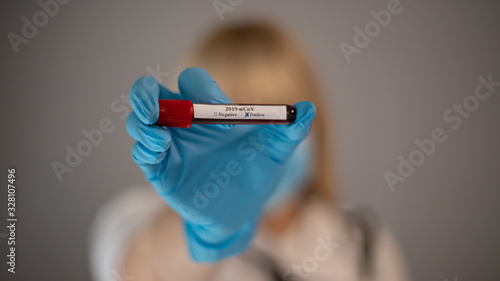 Doctor with syringe in hand. photo