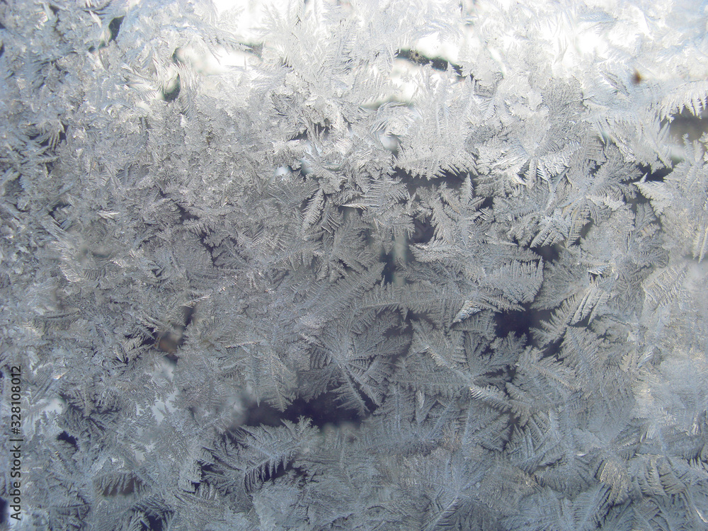 Texture of frosty patterns. Winter frosty patterns on the glass. New ...
