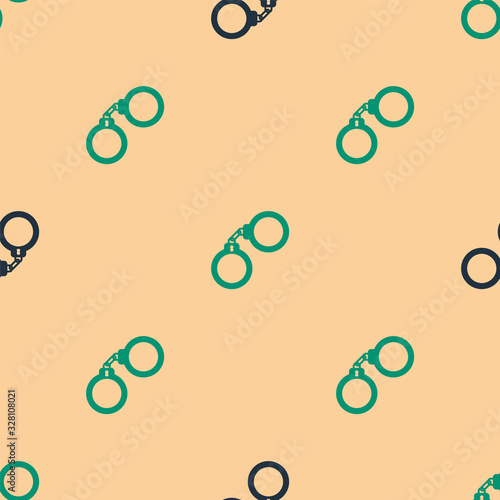 Green and black Handcuffs icon isolated seamless pattern on beige background. Vector Illustration