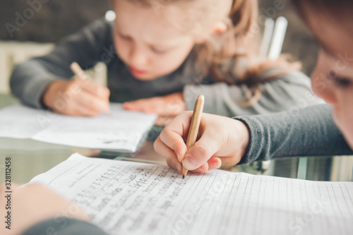 Bild auf Leinwand Schoolboy and schoolgirl writing letters