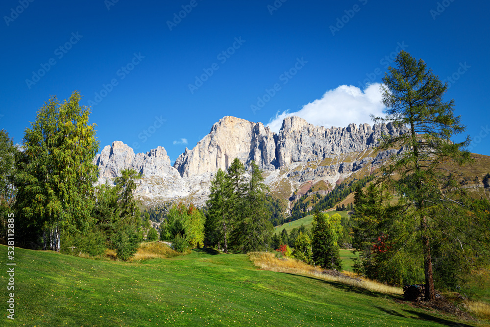 Beautiful alpine landscape. Carezza village. Roda di Vael mountain group.
