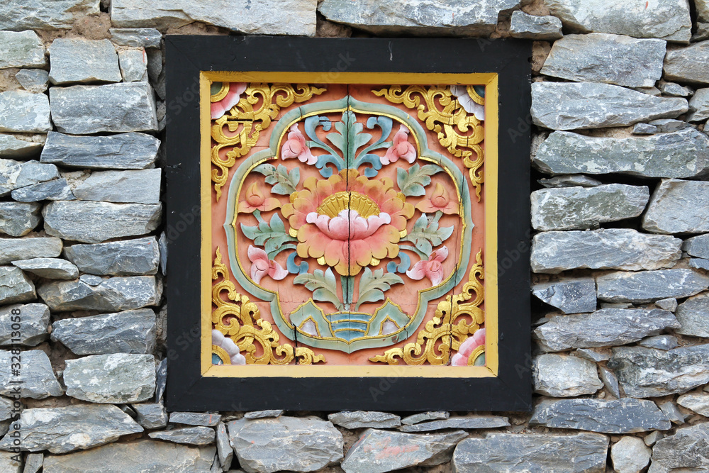 The lotus sculpture on the stone wall. The lotus sculpture on the stone wall.