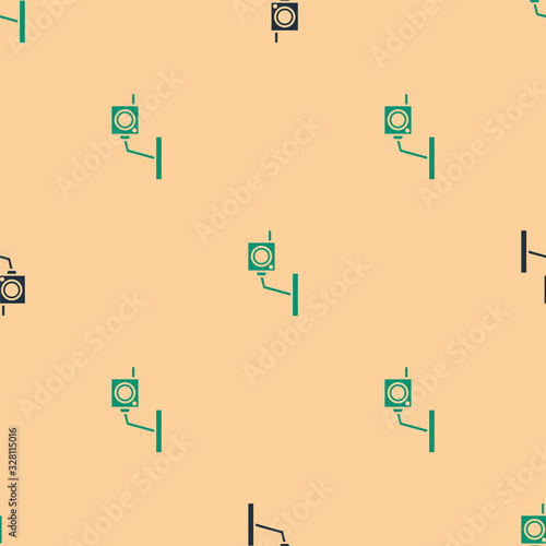 Green and black Security camera icon isolated seamless pattern on beige background. Vector Illustration