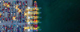 Container ship loading and unloading in deep sea port, Aerial view of business logistic import and export freight transportation by container ship in open sea, Container loading Cargo freight ship.