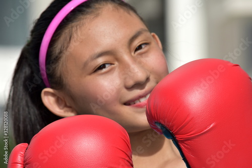 Happy Sporty Diverse Female Boxer Wearing Boxing Gloves