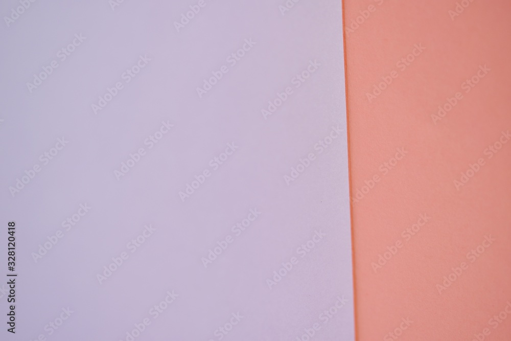 flat lay of pastel color paper in pink and orange