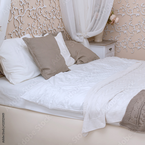 Fototapeta Naklejka Na Ścianę i Meble -  Double bed in the bedroom with two pillows