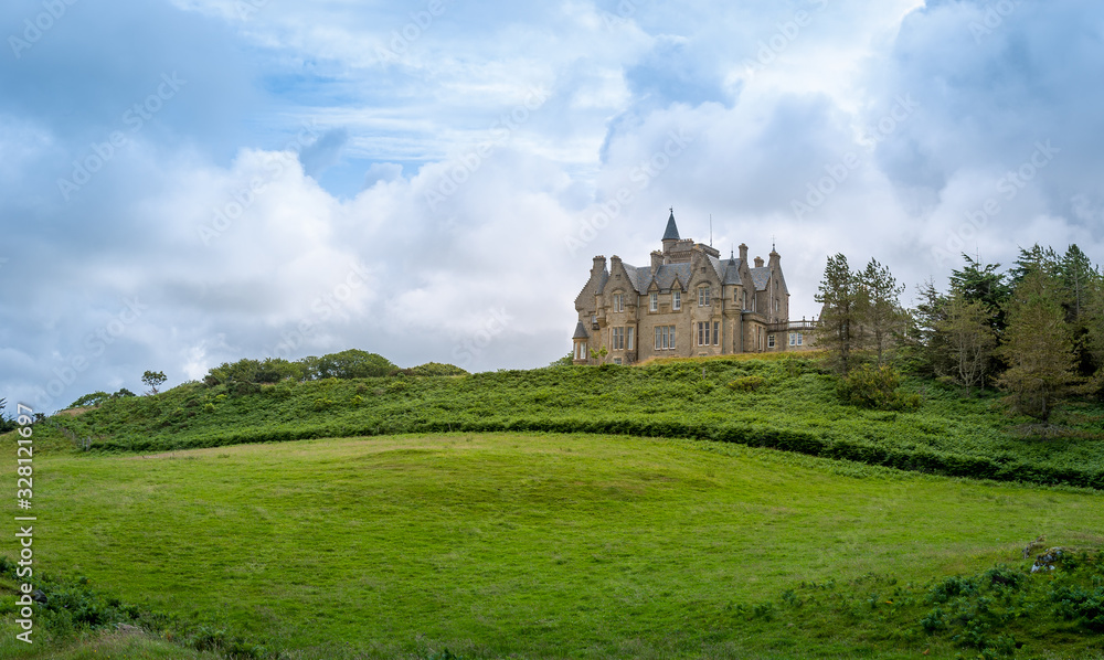 Green fields of Glengorm Castle - travel destination at Mull island, Scotland. Green fields of Glengorm Castle - travel destination at Mull island, Scotland.
