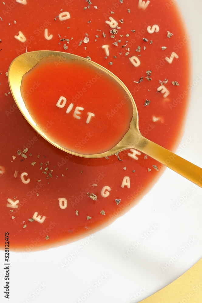 Soup With Letter Noodles On Spoon