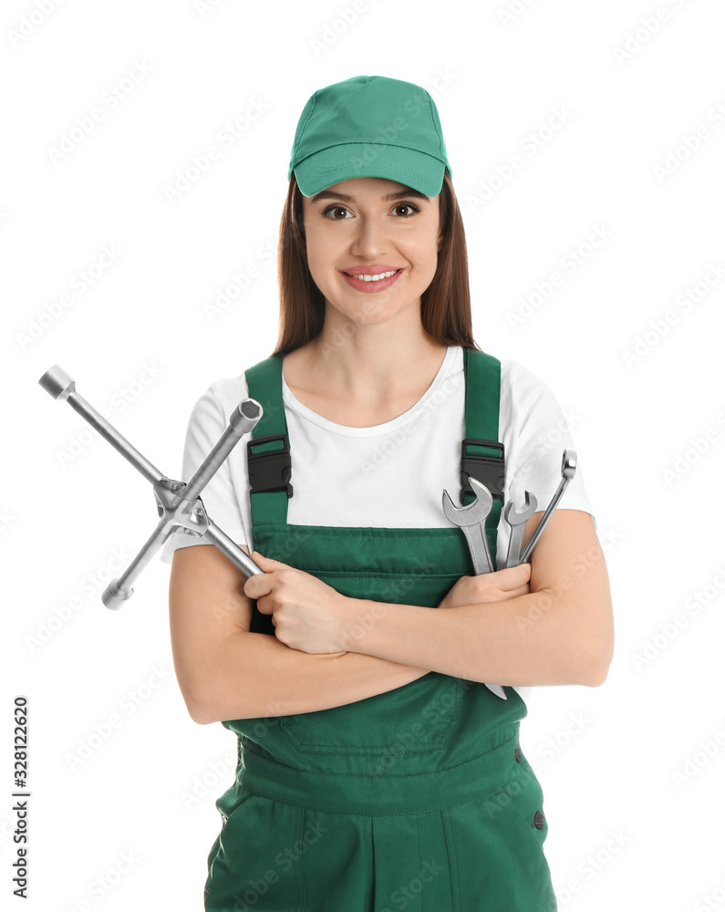 Portrait of professional auto mechanic with wrenches on white background Portrait of professional auto mechanic with wrenches on white background
