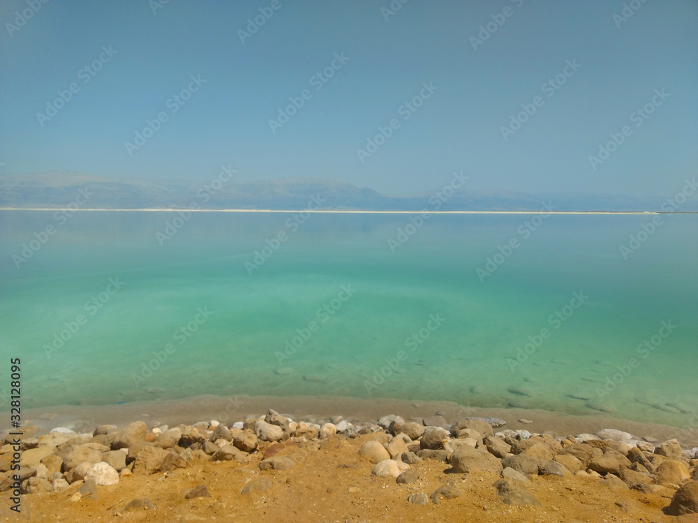 Dead sea, salt in the sea, stones in salt